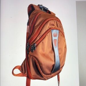 Tumi T-Tech Slim Expandable Backpack Orange Style # 05516FLM